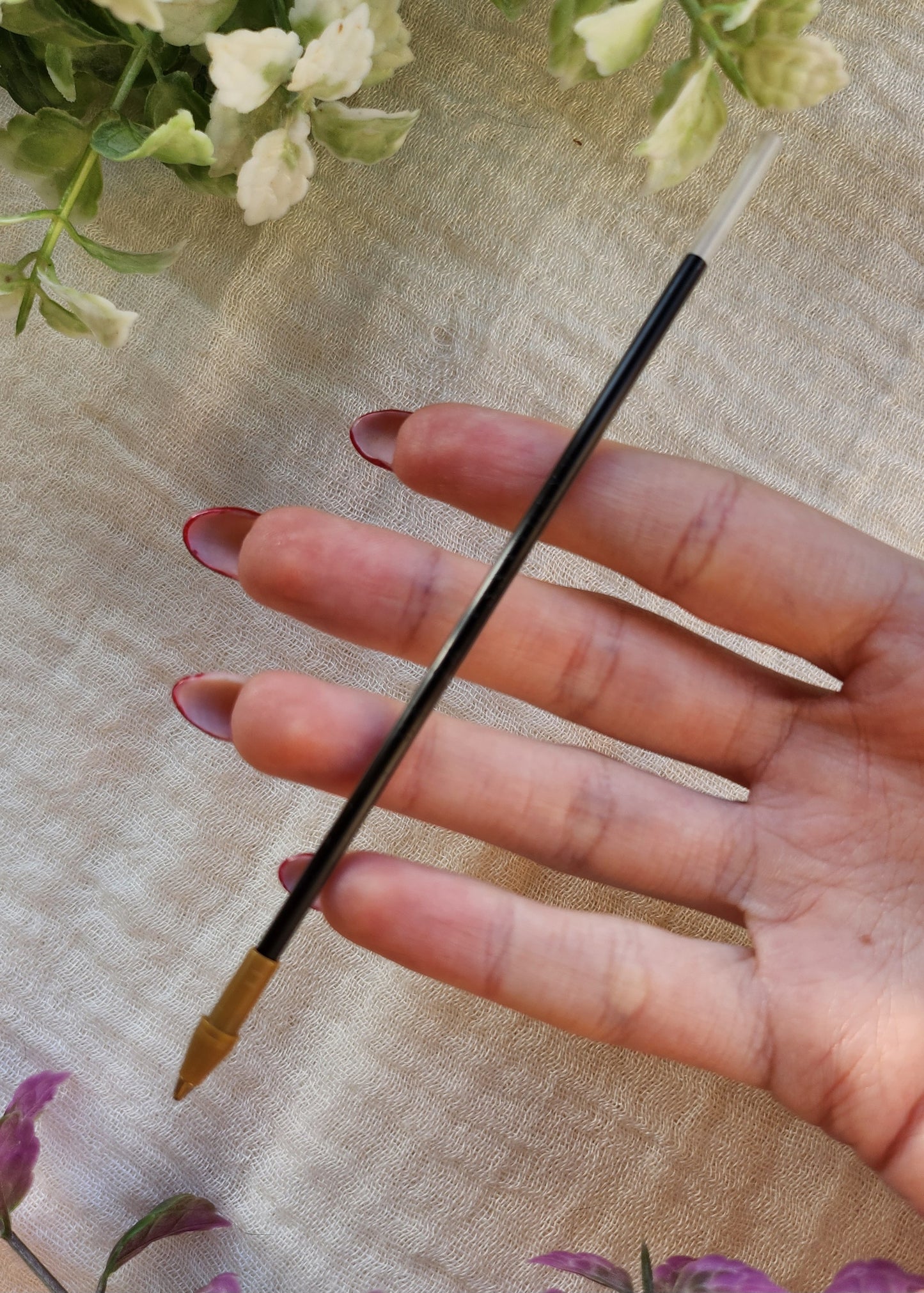 Penna ricaricabile in resina rosa e oro