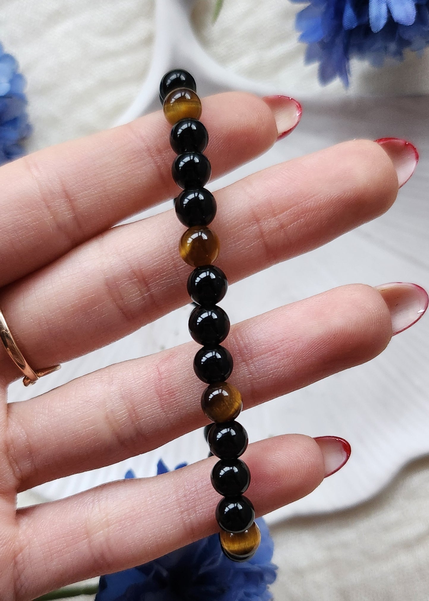 Bracciale a molla in Ossidiana nera e Occhio di Tigre