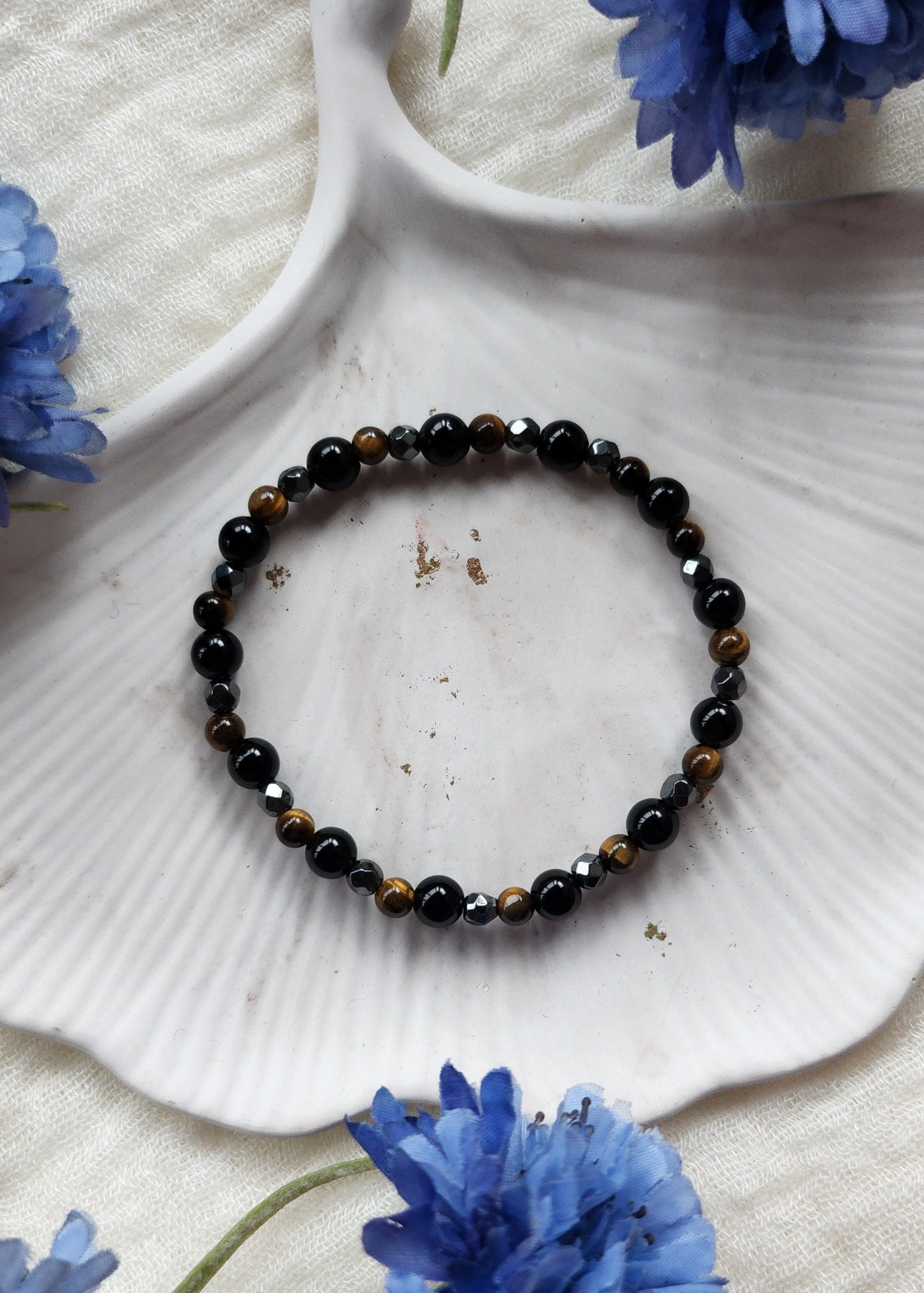 Bracciale a molla triplice protezione