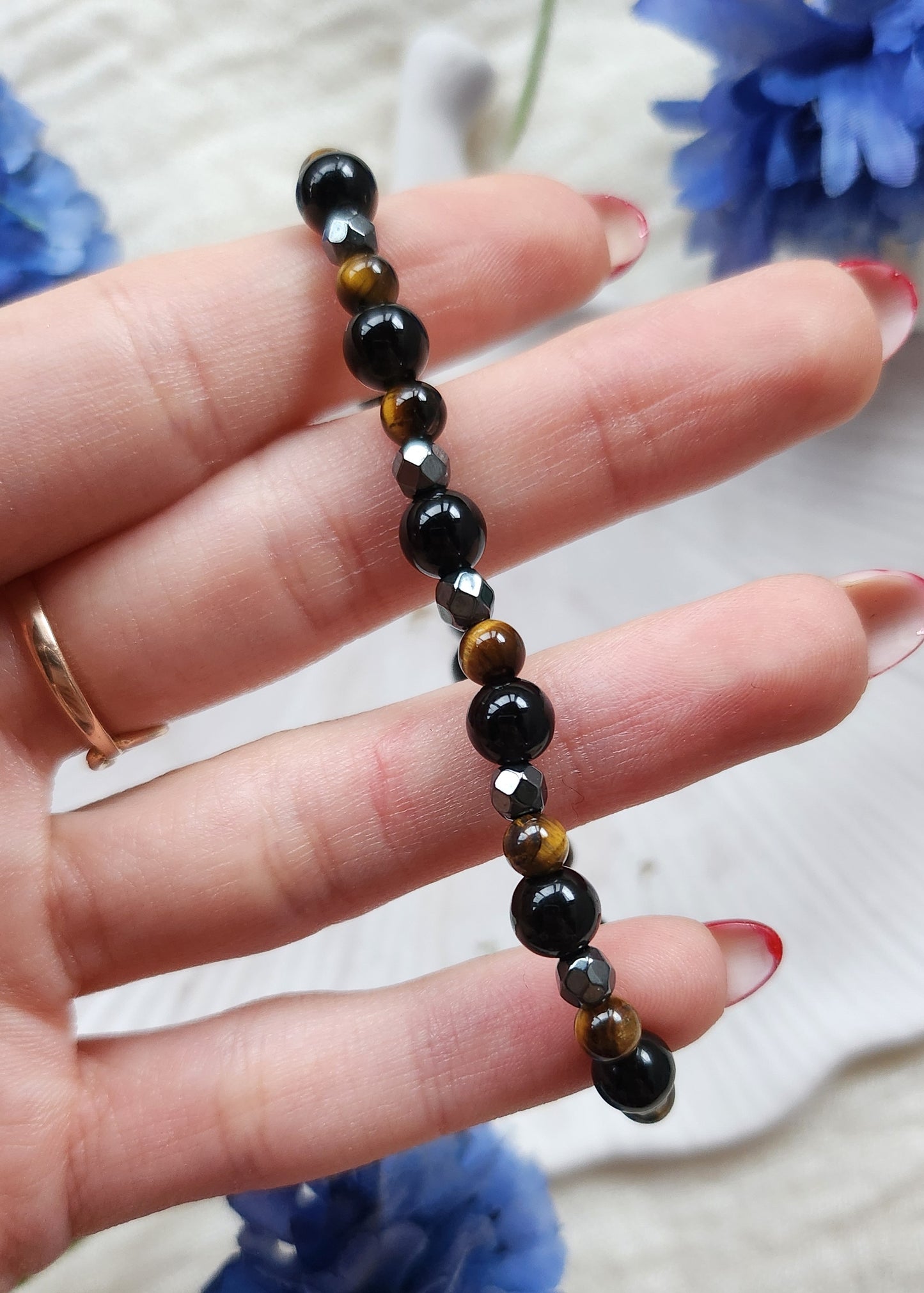 Bracciale a molla triplice protezione