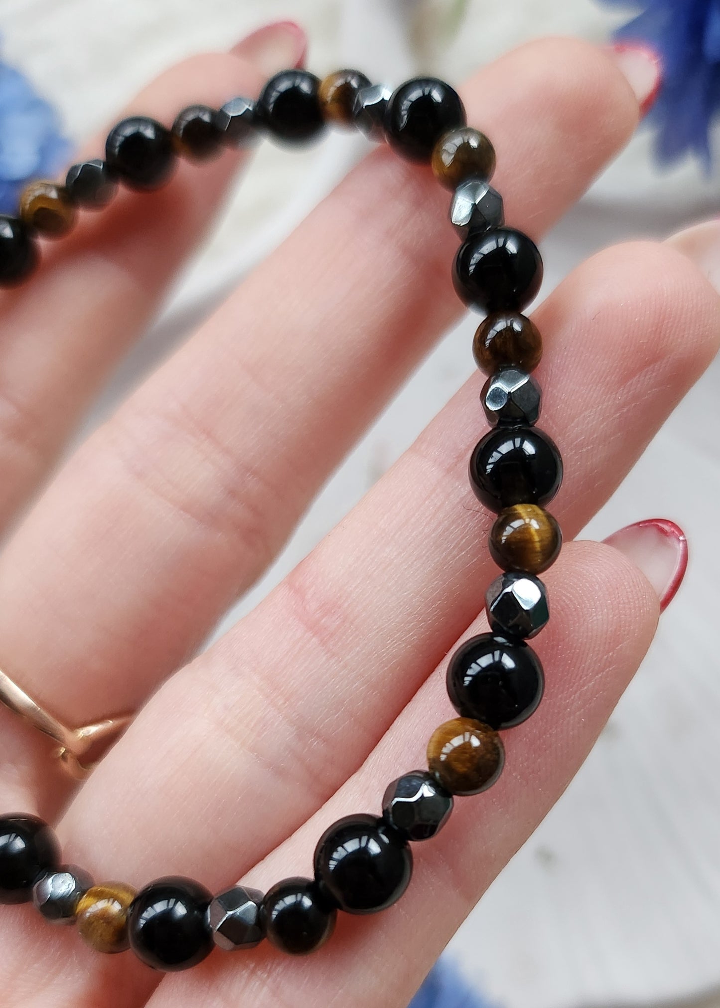 Bracciale a molla triplice protezione