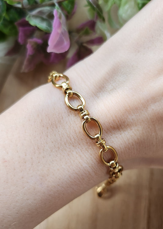 Bracciale in acciaio dorato a maglia ovale