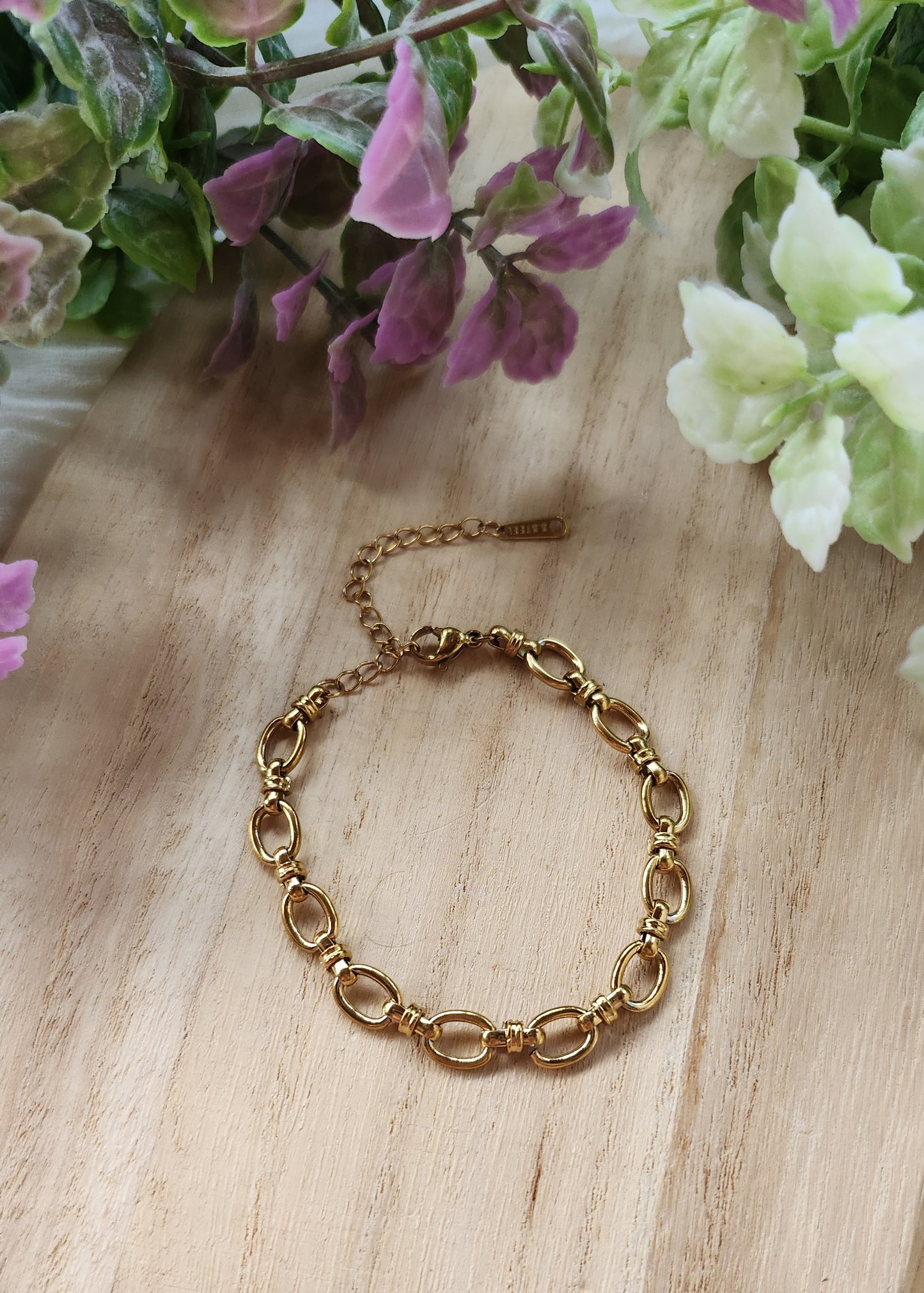 Bracciale in acciaio dorato a maglia ovale